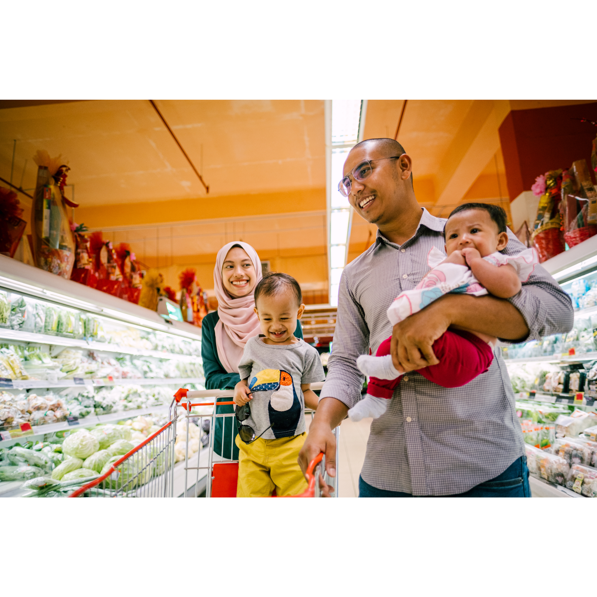 Family grocery shopping together
